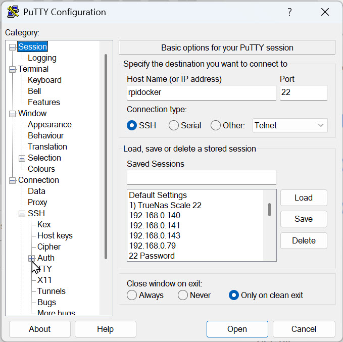 PuTTY Configuration window showing the Session screen with hostname 'rpidocker' entered in the Host Name field, port 22, SSH selected, and an existing Saved Sessions list containing multiple stored connections