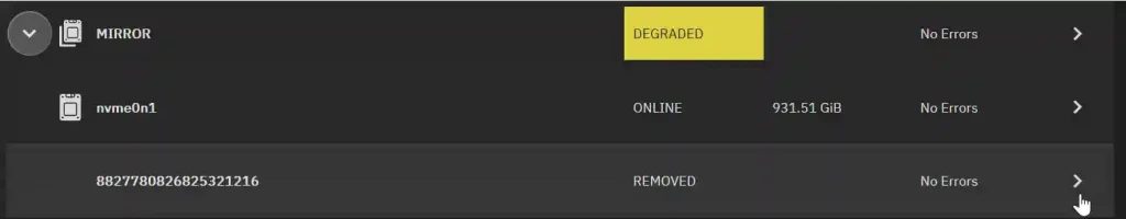 A screenshot of a computer interface displaying the status of storage devices. At the top, a yellow alert box indicates "MIRROR DEGRADED." Below, two storage devices are listed: "nvme0n1" is online with 931.51 GiB capacity and no errors; a device with a long numeric ID is noted as removed and has no errors. On the right, chevron icons suggest additional information is available.