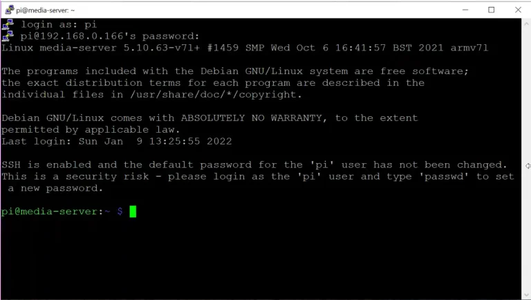 Terminal window displaying a successful SSH login to a media server, with a security notice about the default 'pi' user password not being changed.